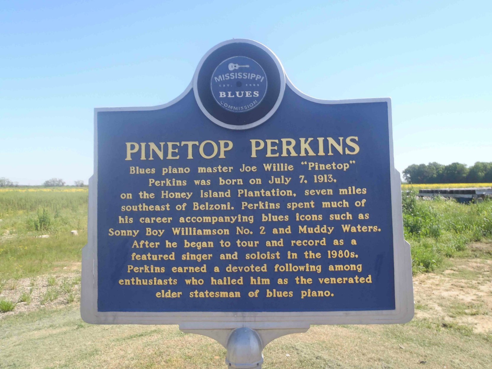 Mississippi Blues Trail marker commemorating Pinetop Perkins, on Highway 49W, north west of Belzoni, Mississippi
