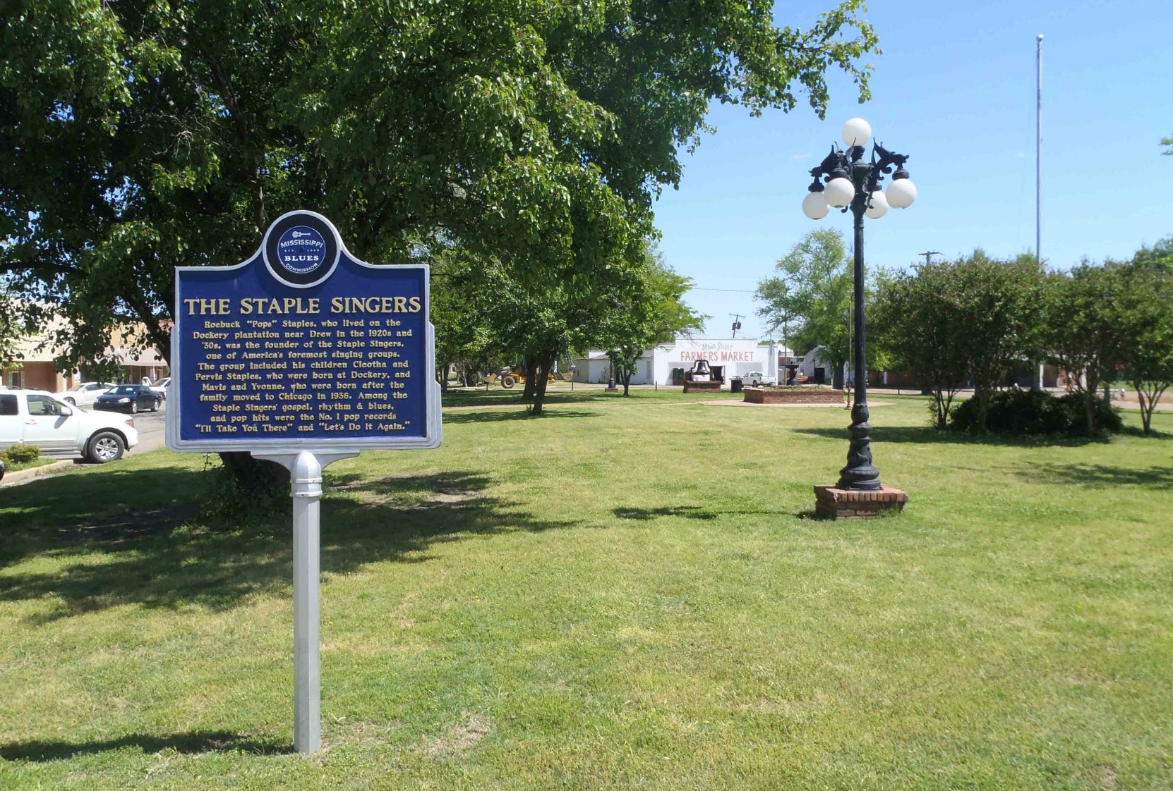 The Mississippi Blues Trail marker for The Staple Singers, Main Street, Drew, Sunflower County, Mississippi