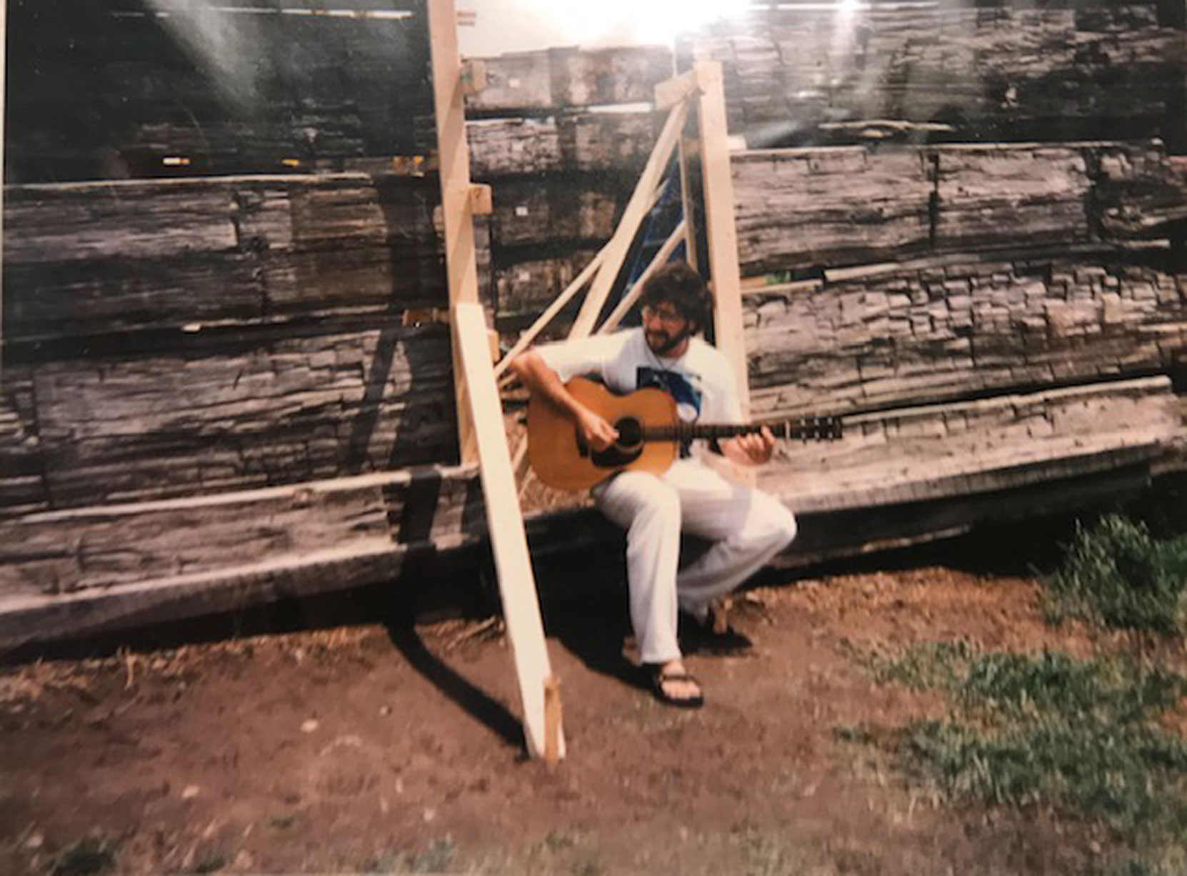 Larry Amato at the Muddy Waters cabin as it was being disassembled at Stovall Farms for its move to the Blues Museum, , Clarksdale, Mississippi, circa 1990's (photo: Larry Amato)