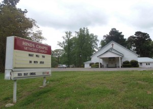 Hinds Chapel Methodist Church sign. Former Johnny Burnette Trio guitarist Paul Burlison is buried in the cemetery behind the church.