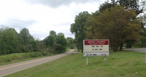 Hinds Chapel Methodist Church sign. Former Johnny Burnette Trio guitarist Paul Burlison is buried in the cemetery behind the church.