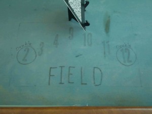 Markings on Harold "Hardface" Clanton's dice table, Tunica Museum, Tunica County, Mississippi.