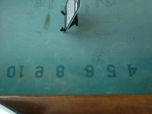 Markings on Harold "Hardface" Clanton's dice table, Tunica Museum, Tunica County, Mississippi.