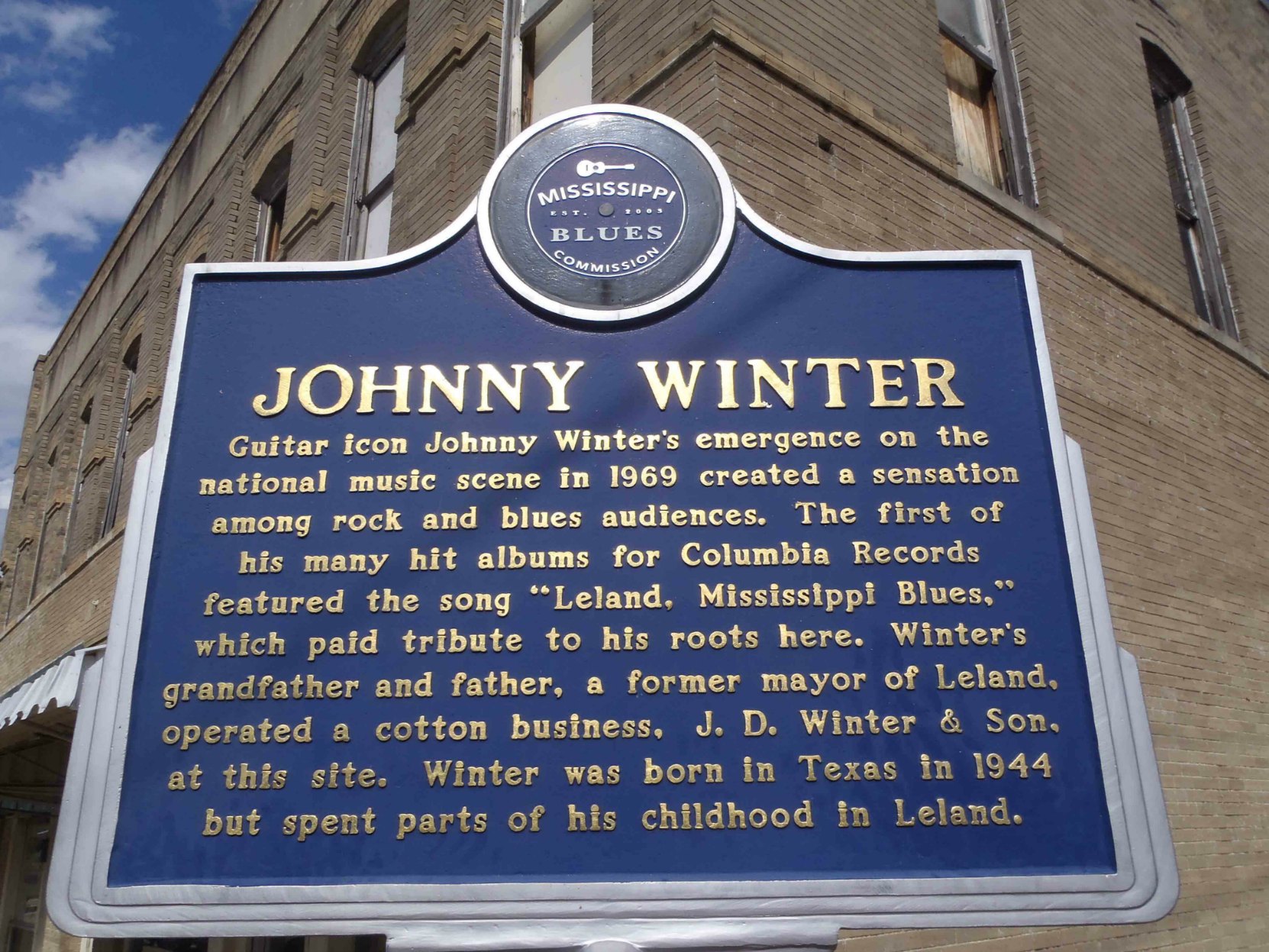 The Mississippi Blues Trail marker for Johnny Winter, Leland, Mississippi