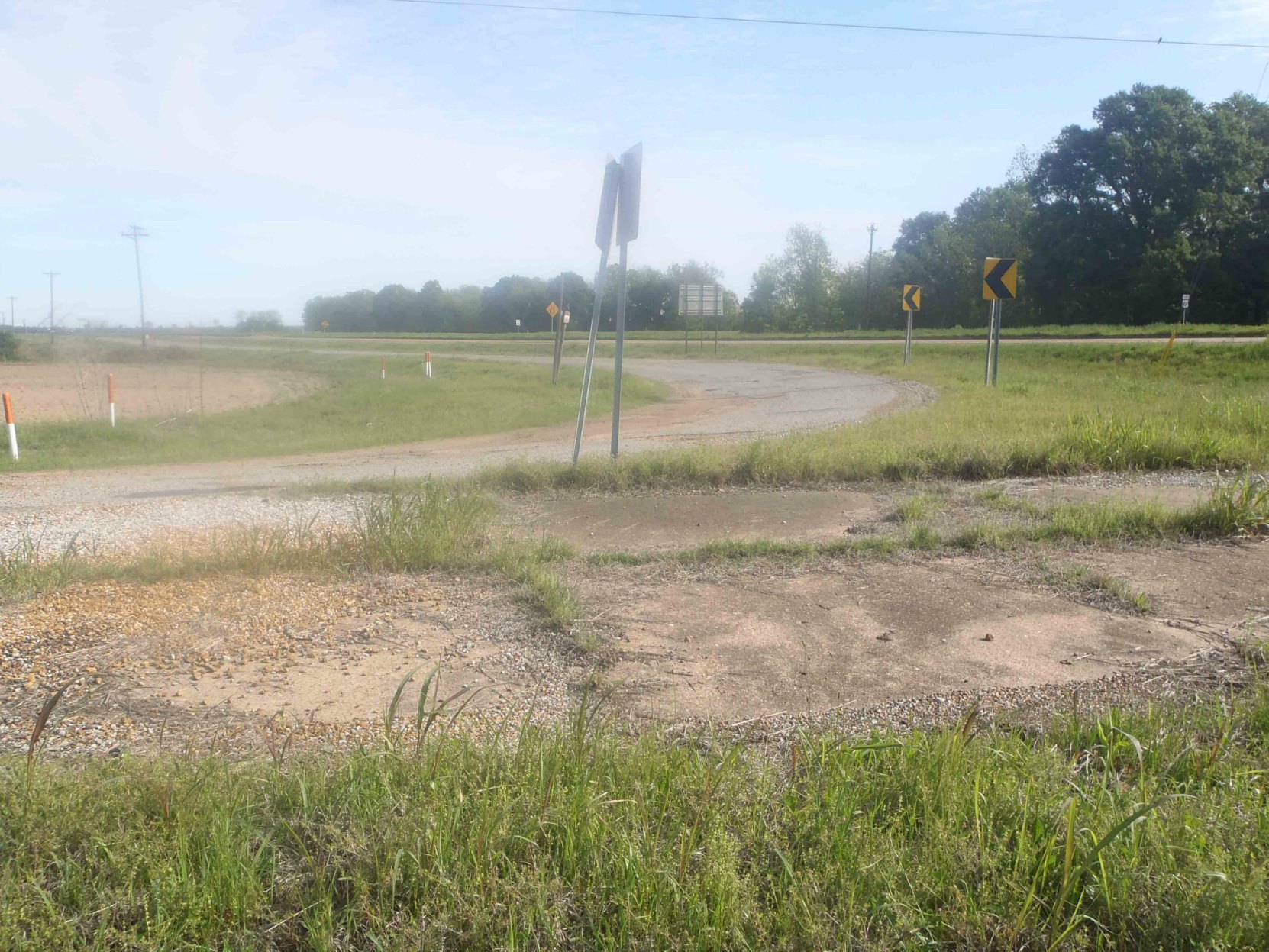 The old road on the west side of the present intersection of Highway 49E and Highway82, Leflore County, Mississippi, looking north east.