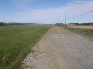 The old road on the west side of the present intersection of Highway 49E and Highway82, Leflore County, Mississippi, looking west.