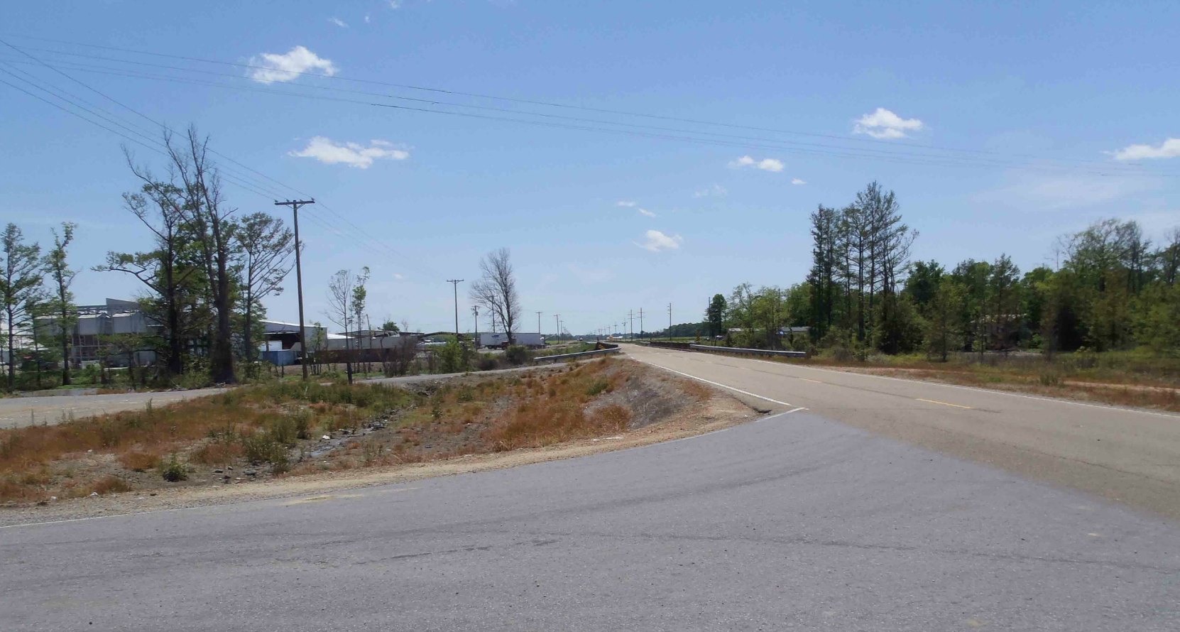 The second reputed site of Robert Johnson's poisoning in 1938, Highway 7 and Leflore County Road 512, near Quito, Leflore County, Mississippi, looking south.