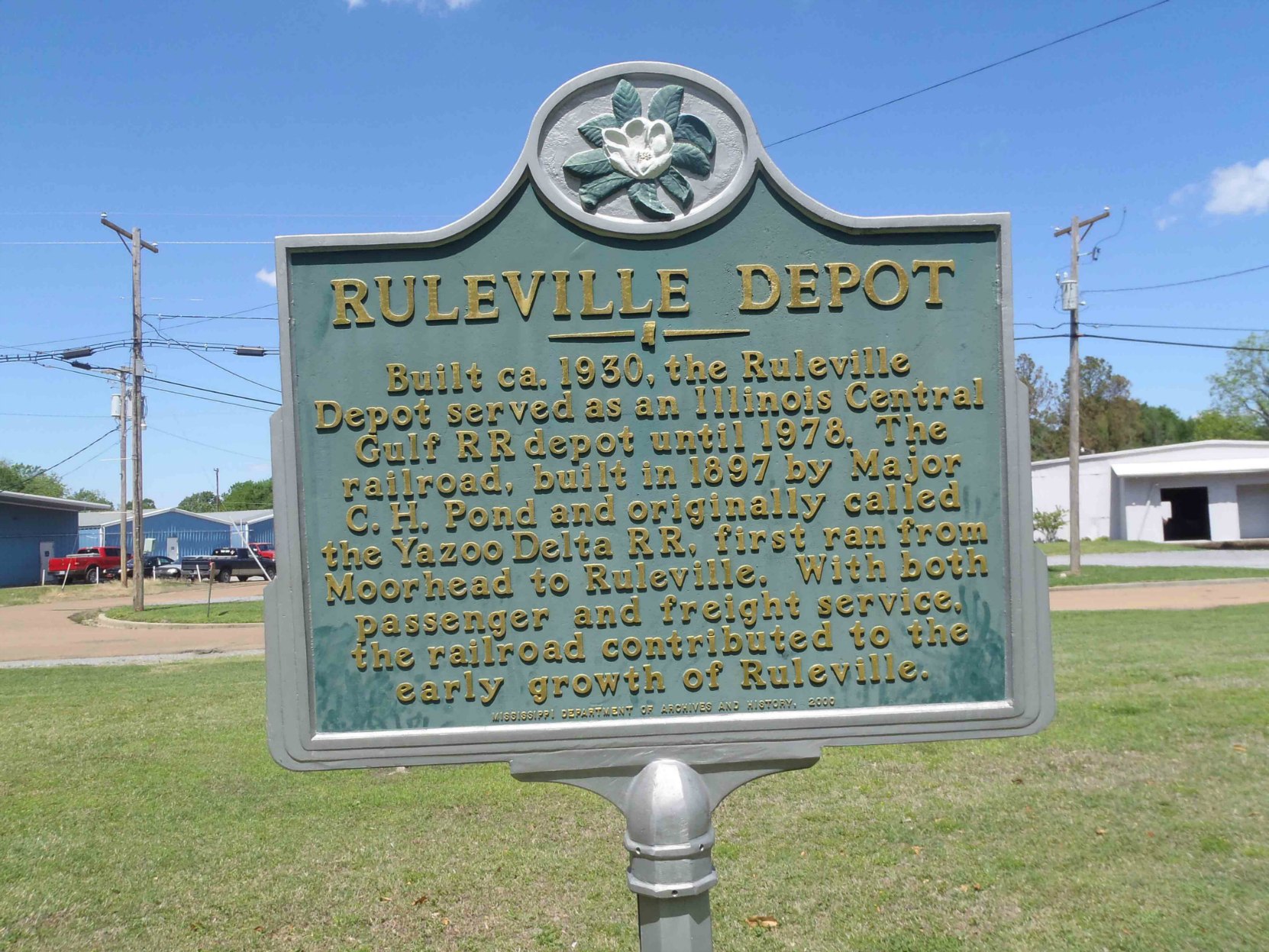 The Mississippi Department of Archives & History marker for the Ruleville Rail Depot building, now the Ruleville Chamber of Commerce, Ruleville, Sunflower County, Mississippi.
