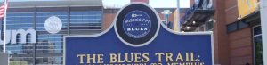 Our web header image for the Mississippi Blues Trail showing the Mississippi Blues trail logo on marker in Memphis, Tennessee