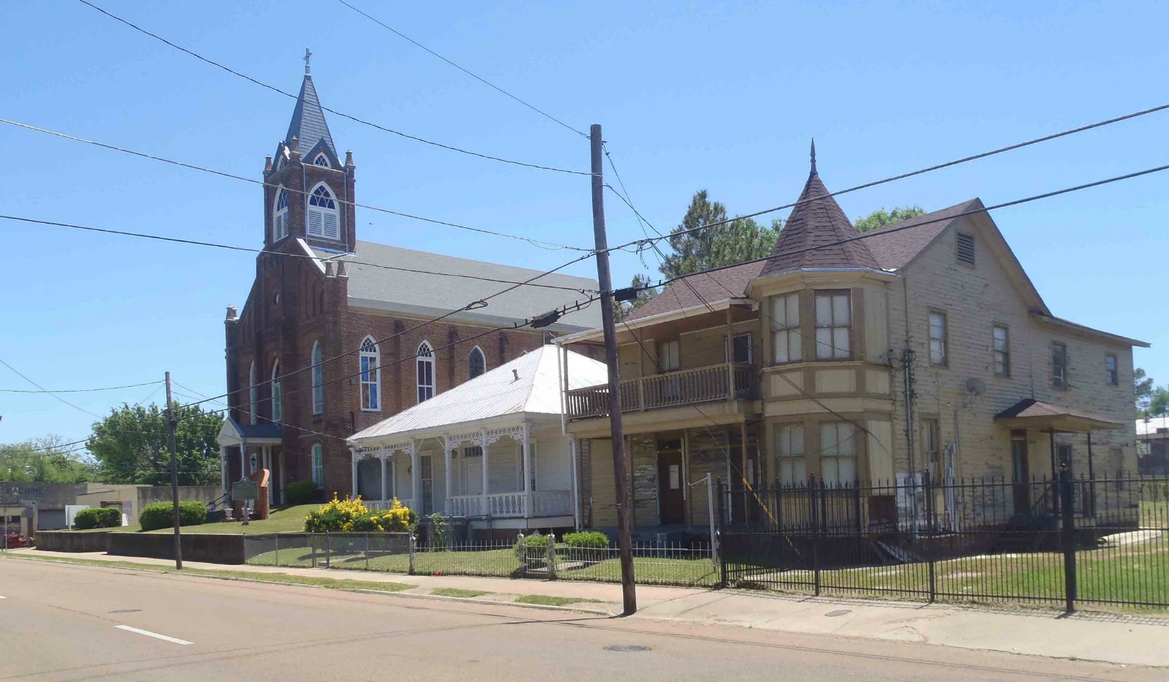Holy Family Catholic Church, Natchez, Mississippi and some of the adjacent neighborhood houses.