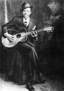This photo of Robert Johnson was taken at Hooks Brothers Photography, 164 Beale Street, Memphis, Tennessee.