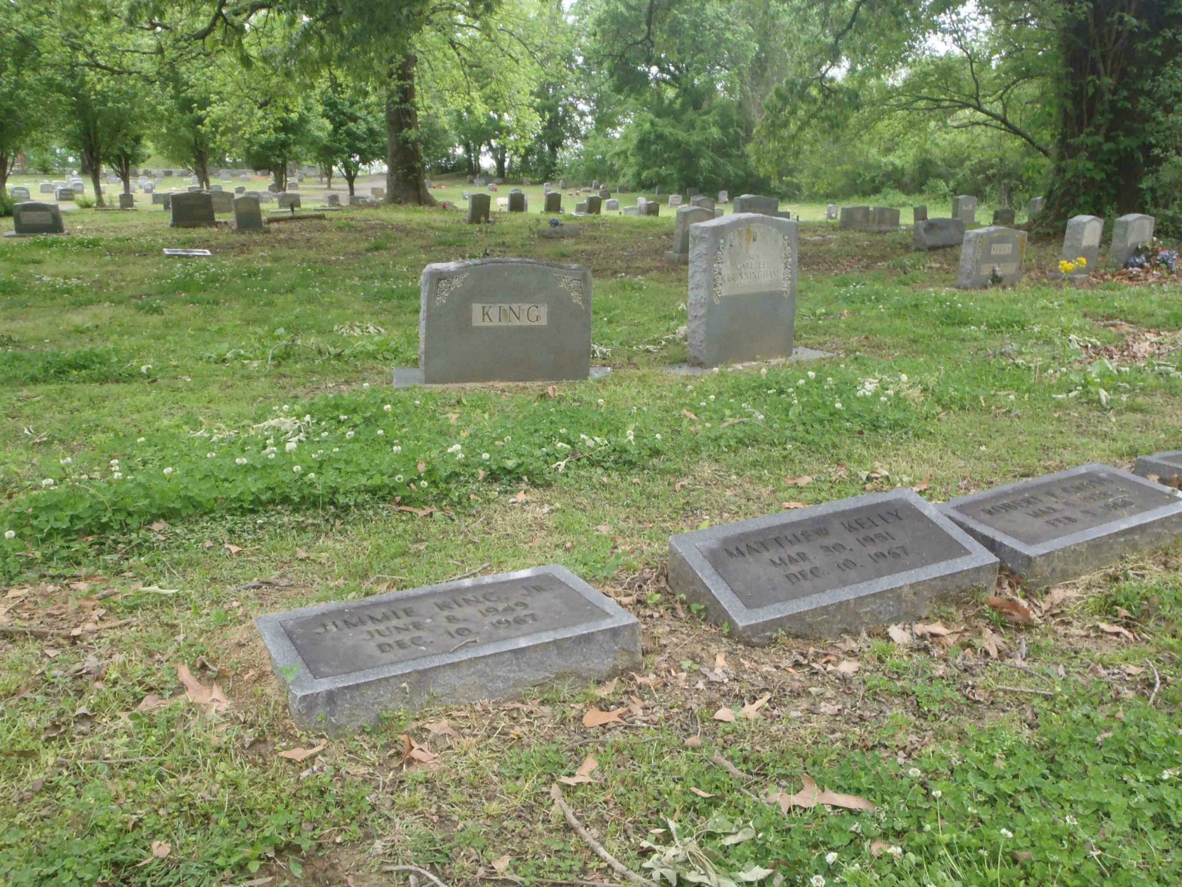 The graves of Carl Lee Cunningham (background) Jimmy King and Matthew Kelly (foreground), New Park Cemetery, Memphis, Tennessee